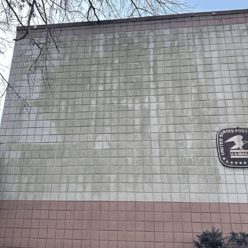 Commercial building exterior before washing - pollution and grime Metro Atlanta